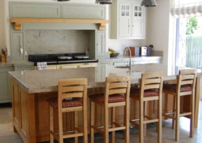 Kitchen Island wooden with sage green cabinets ()
