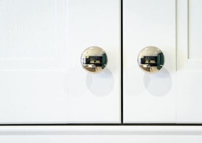 Mangan Woodcraft Classic White kitchen cabinet doors with Chrome knobs