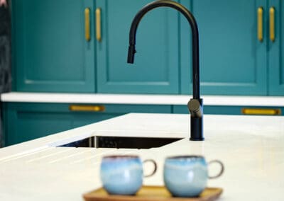 Mangan Woodcraft Modern kitchen with matt black swan neck kitchen tap