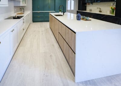 Mangan Woodcraft Showroom with Classic Kitchen install white cabinets and inframe kitchen island