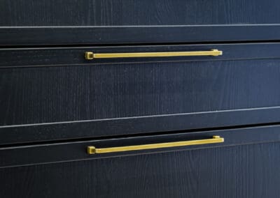 Modern black kitchen drawers with brass square bar handles Mangan Woodcraft