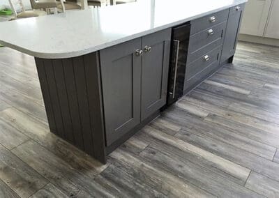 Modern blackkitchen island rounded design with white marble top Mangan Woodcraft ()