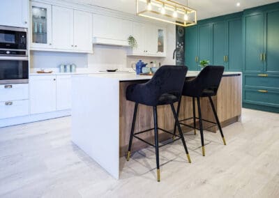 Modern kitchen island in white kitchen visit our showroom in Trim