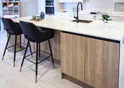 Oak cabinets in an inframe kitchen island by Mangan Woodcraft